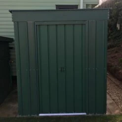 6' X 3' Globel Heritage Green Pent Metal Shed (1.8m X 0.93m) -Lifetina Shop lotus6x3penthgs 6x3 lotus green pent metal shed insitu3 min